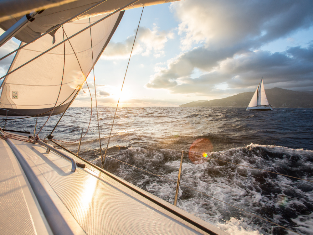 Sailing at sunrise, seeking God's direction to sail.