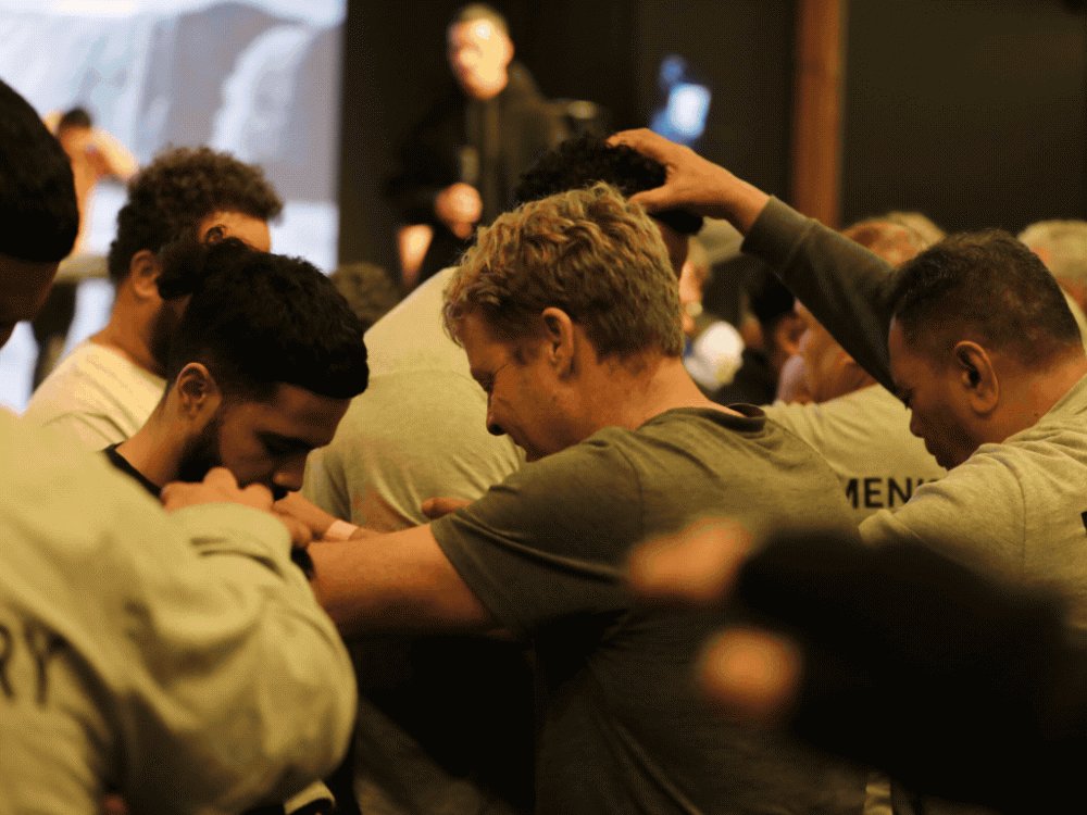 PK Event 2024, men praying for each other, worshipping God together