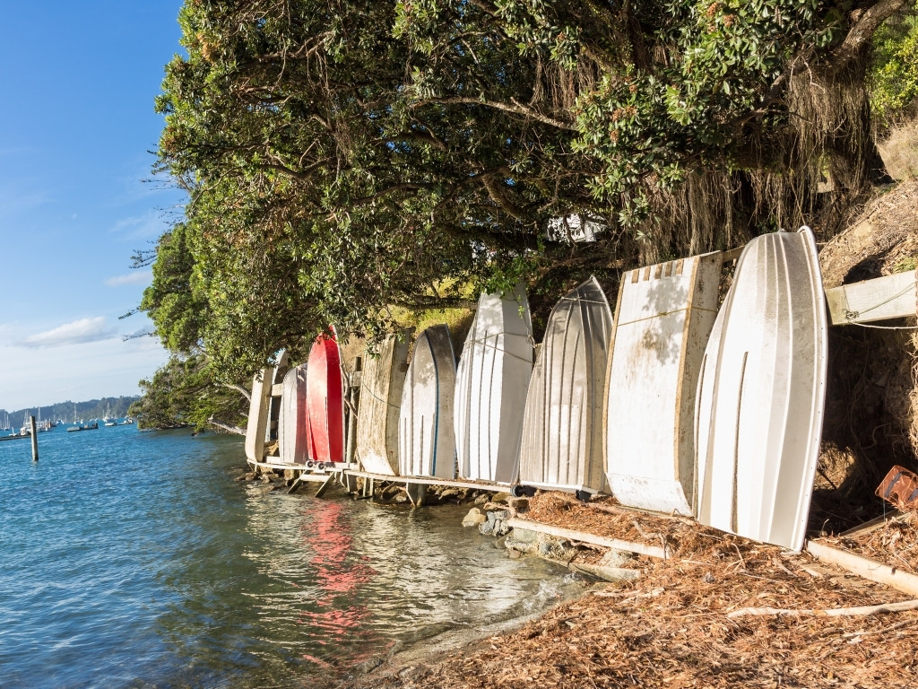 Dinghies in a row on the beach, 