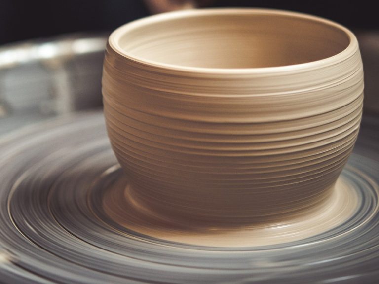 Potter making a clay jar