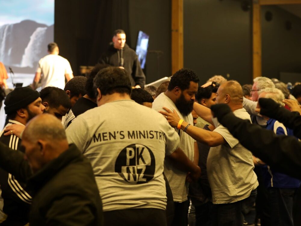 Men gathered at a Promise Keepers NZ event, together in community and strength.
